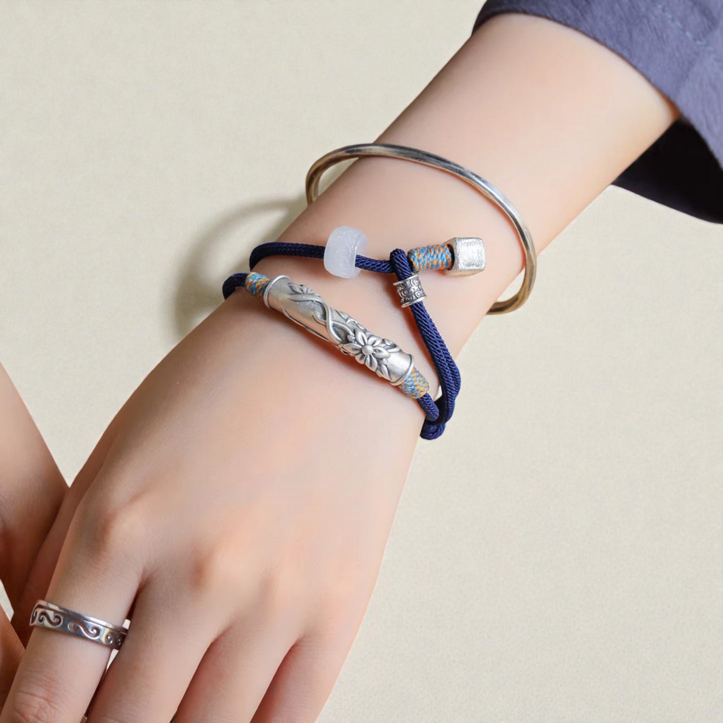 s999 Silver Flower Blessing Charm Hand Woven Unisex Rope Bracelet